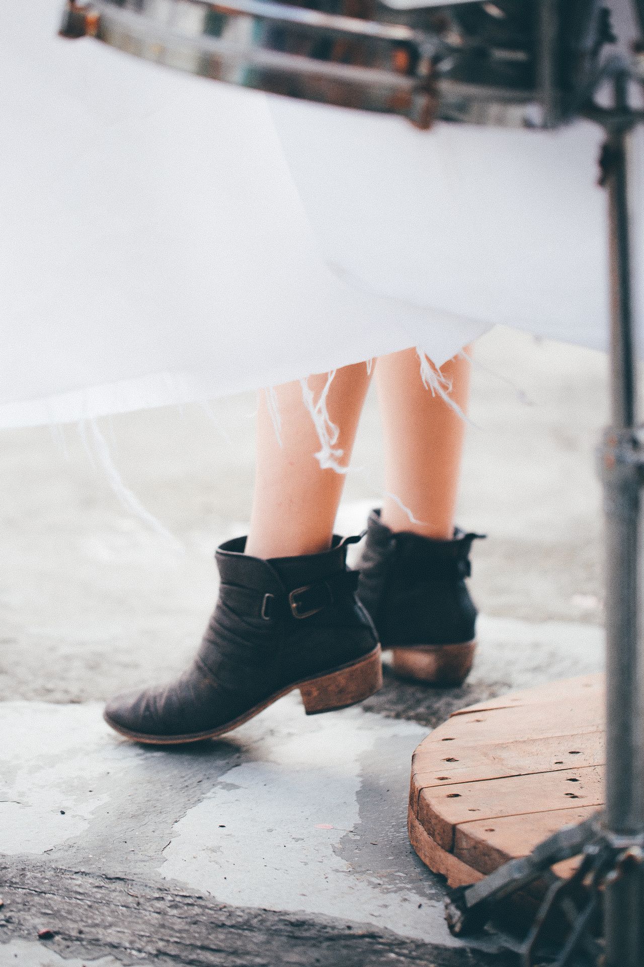Black ankle boots with a white dress