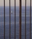 Ship Sailing in Sea View through Gates