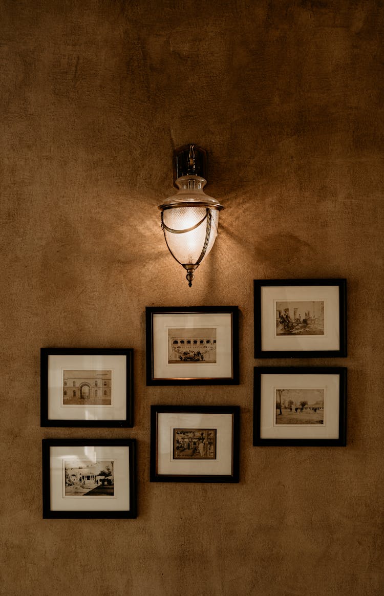 Photos In Frames On A Wall 