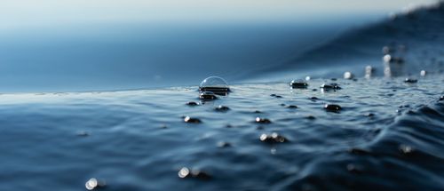 Free Bubbles on the water Stock Photo