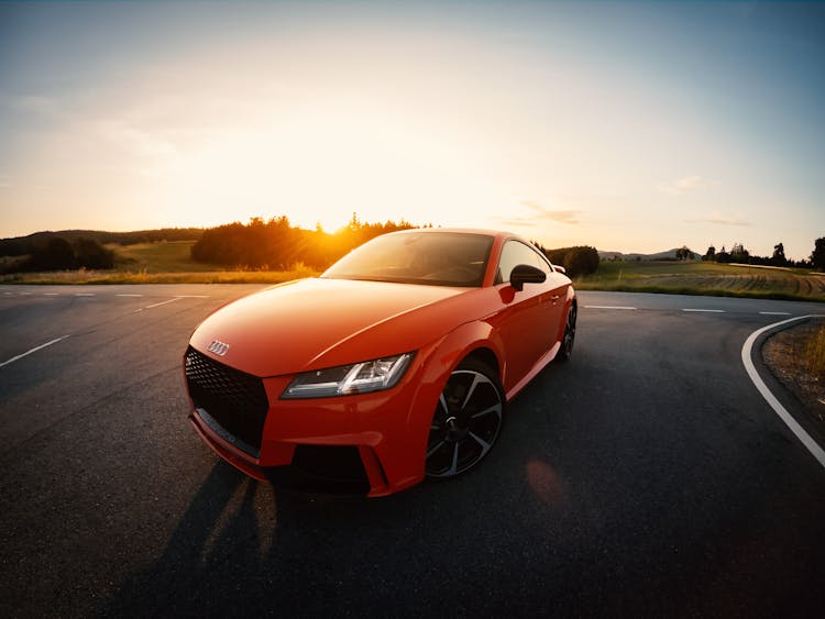 Sports Car At Sunset