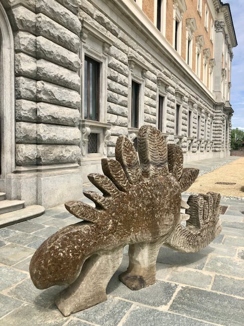 A Dinosaur Statue Made of Stone