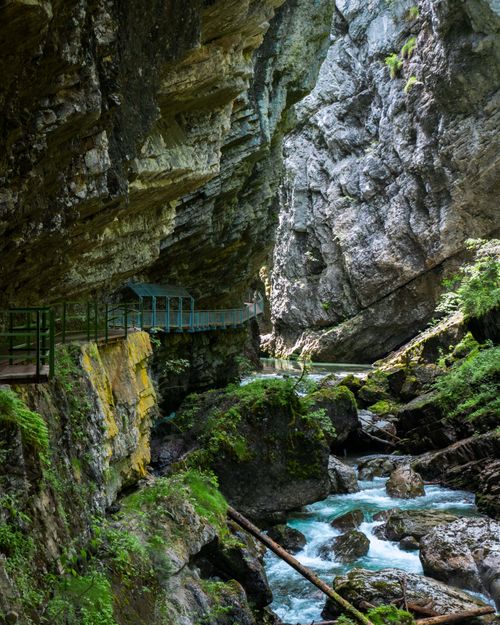 Free Discover the lush gorge with a scenic stream and viewing deck in Oberstdorf, Germany. Stock Photo