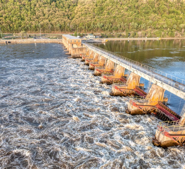 Open Flood Gates Of A River Dam