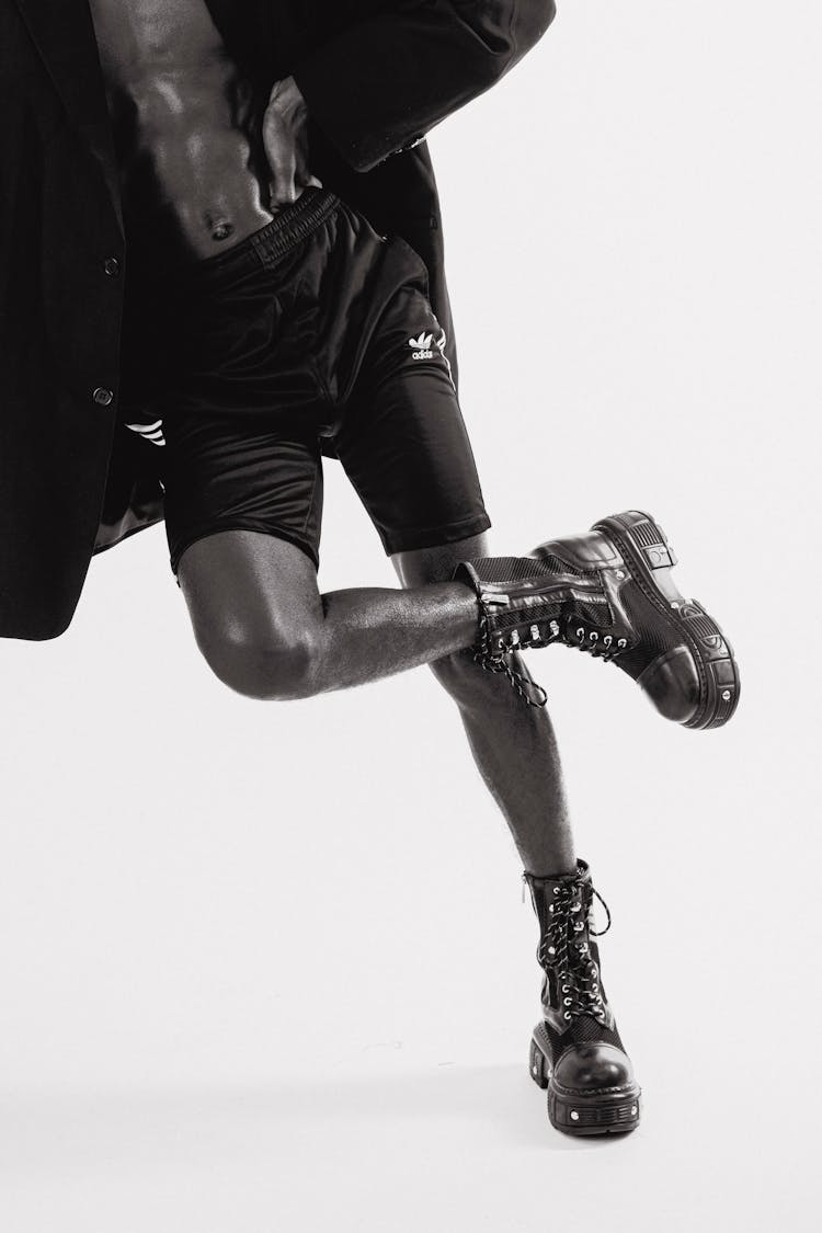 Muscular Man In Trendy Wedge Shoes In Studio