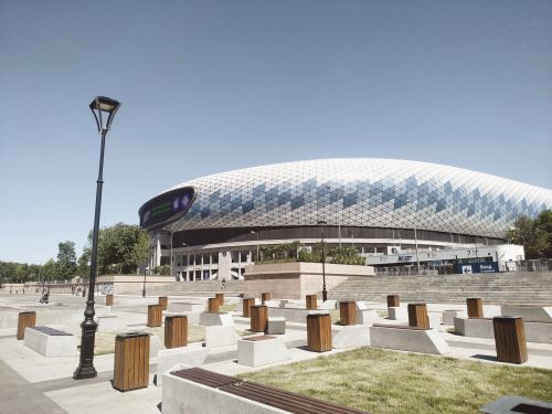 Free Exterior view of the modern Dinamo Lev Yashin Stadium in Moscow with blue sky and urban surroundings. Stock Photo