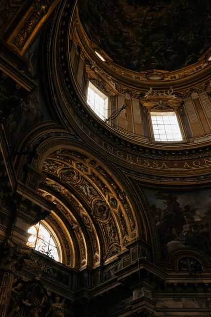 A detailed view of the ornate dome interior in Sant'Agnese in Agone, Rome, Italy.