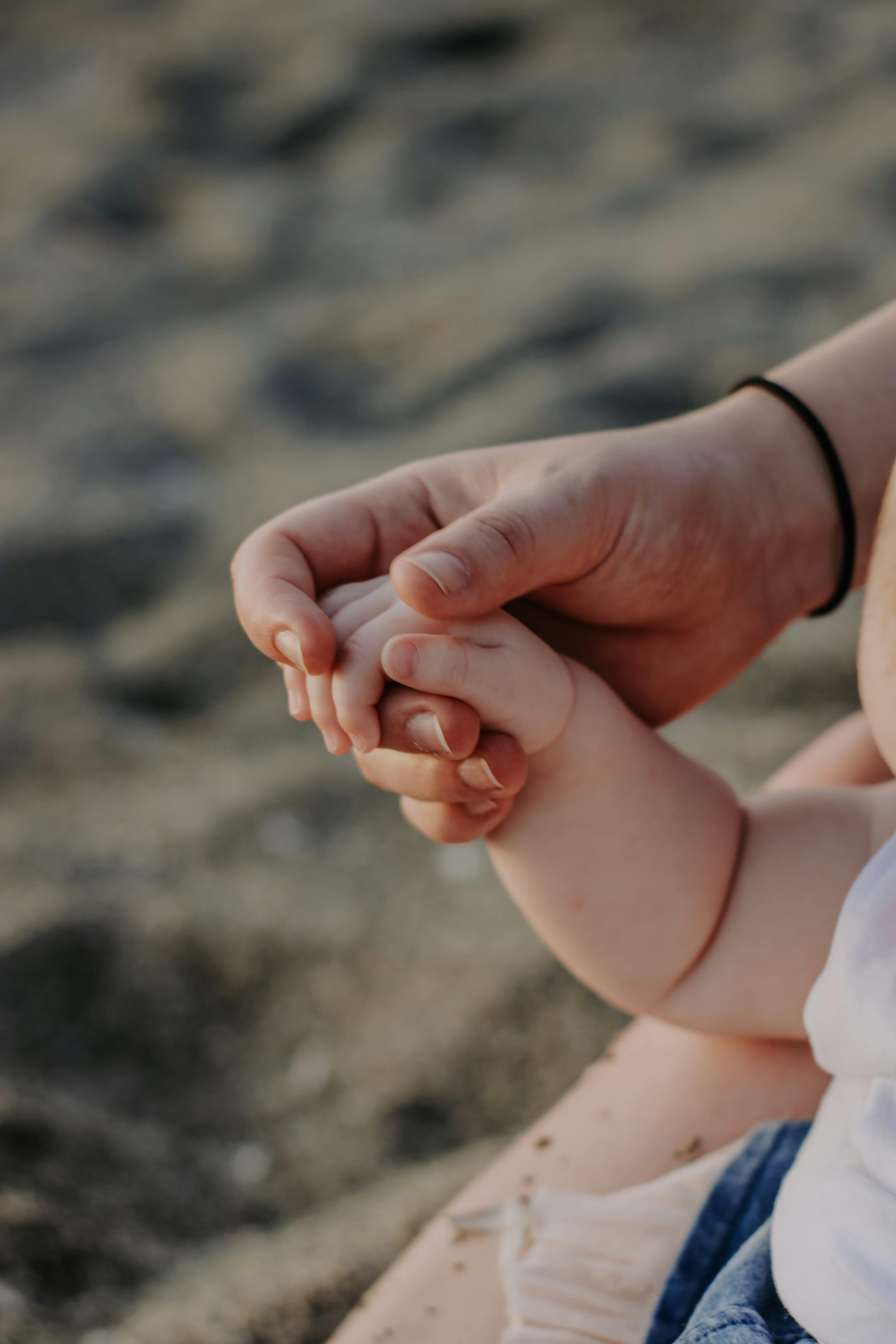 Little Baby Hand Close Up Free Stock Photo