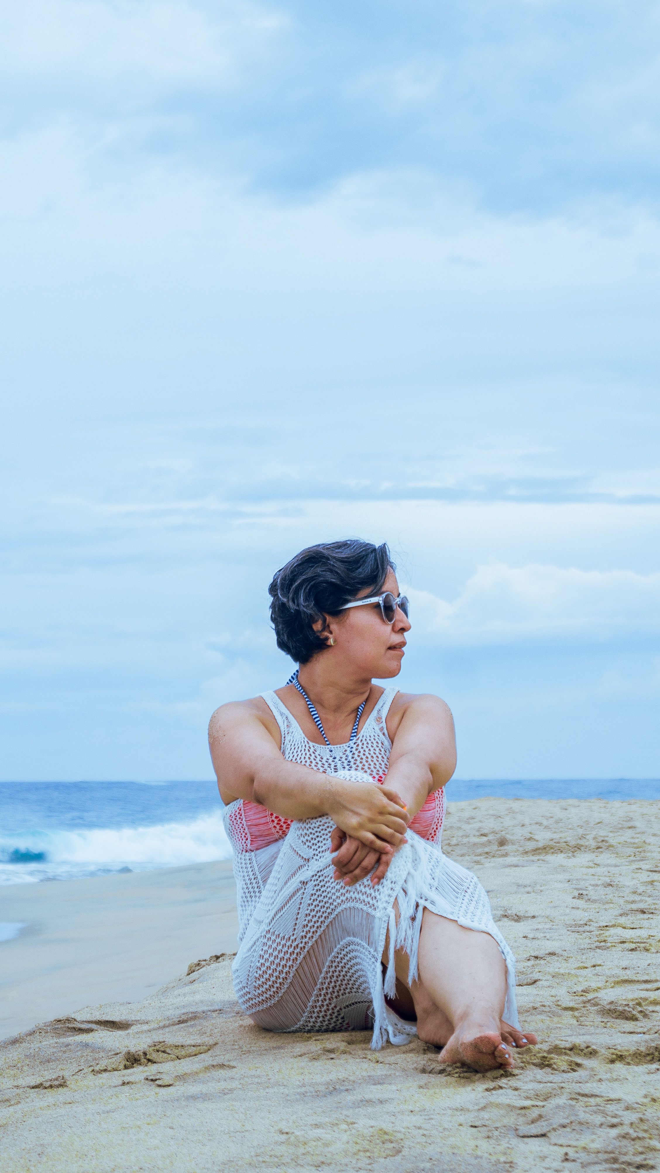 Woman in White Dress Sitting on a Bench · Free Stock Photo