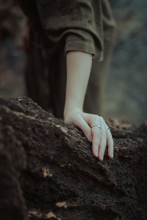 Touching Bumpy Rocks Woman Touching Rock · Free Stock Photo