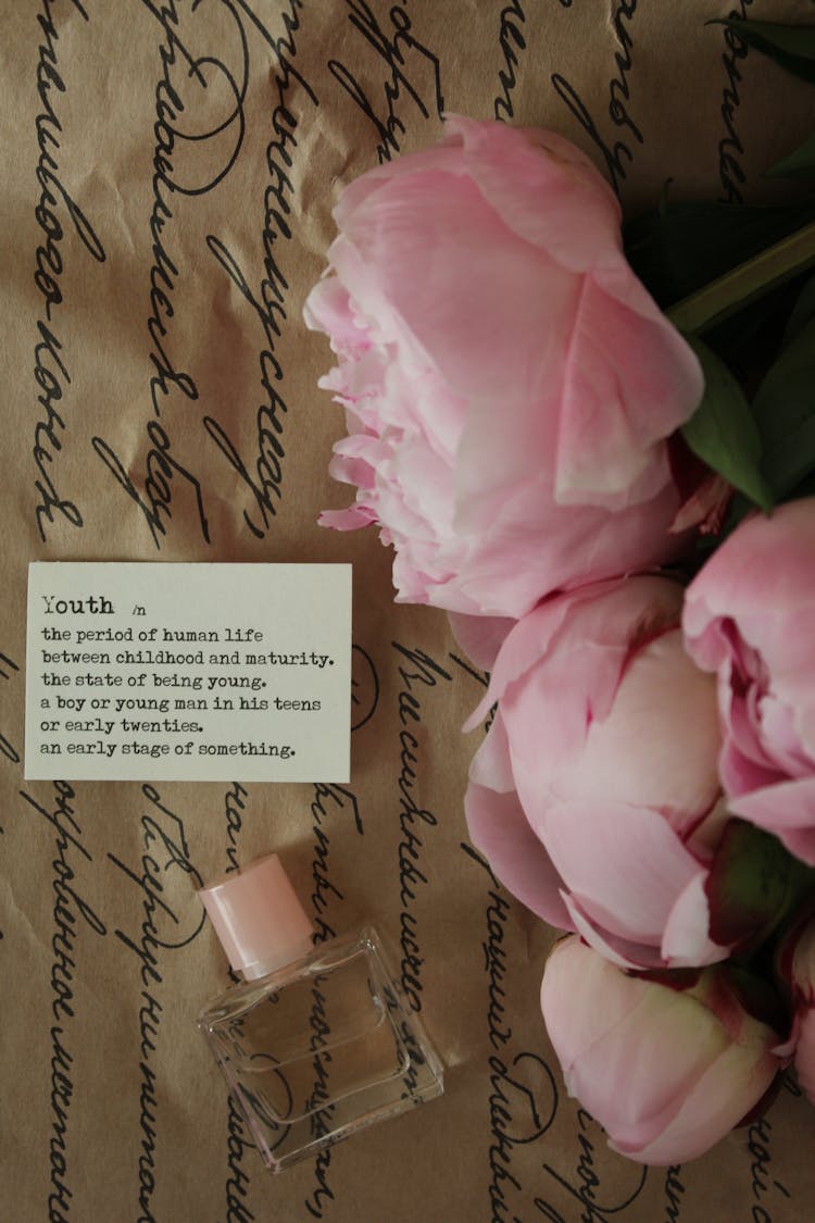 A Card And Flowers