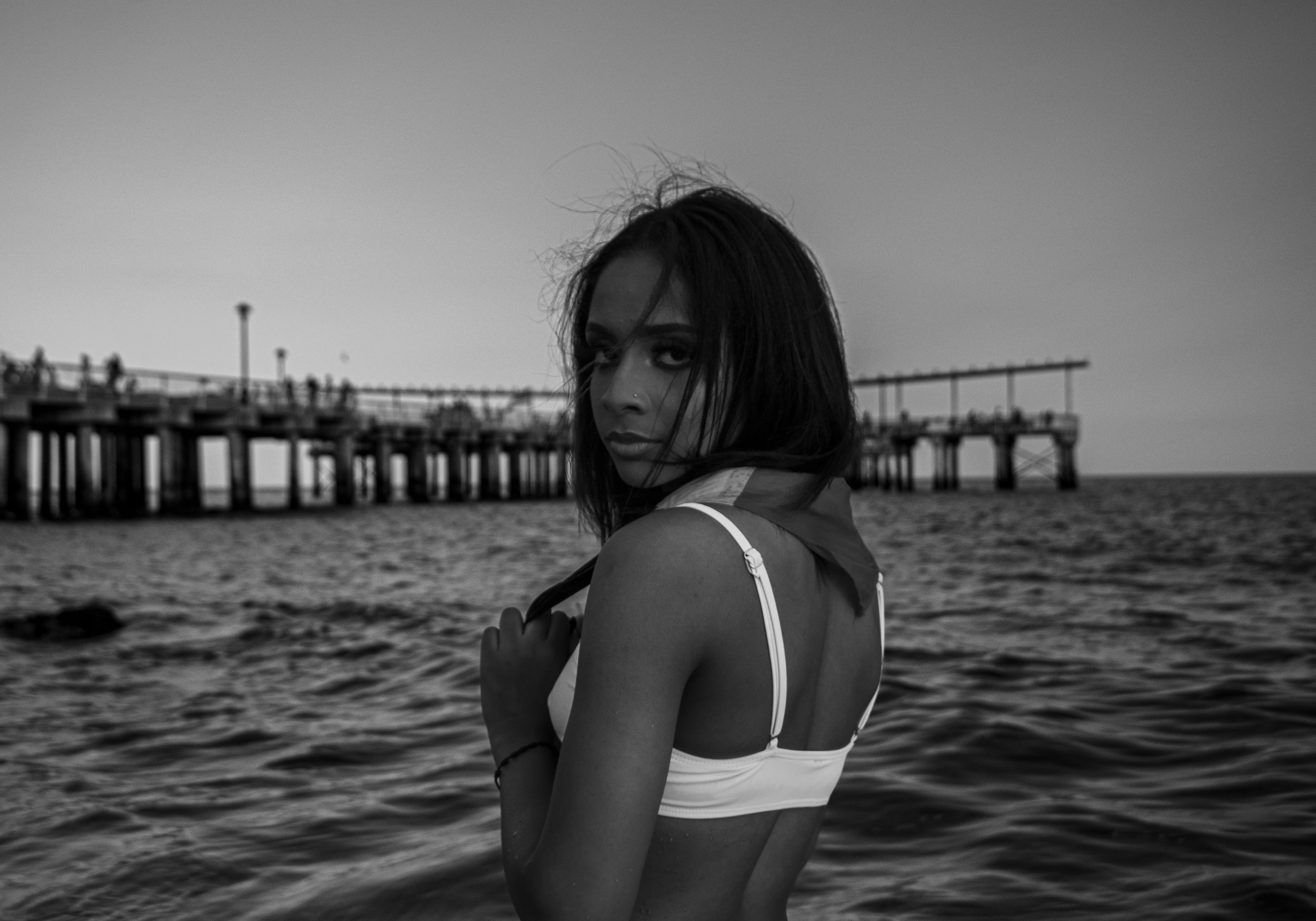 Grayscale Photo of a Woman in Bikini Standing on the Beach · Free Stock ...