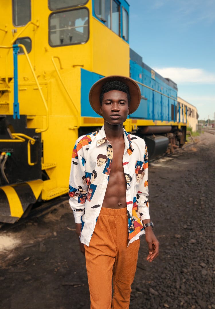 Man Posing In Hat And Shirt