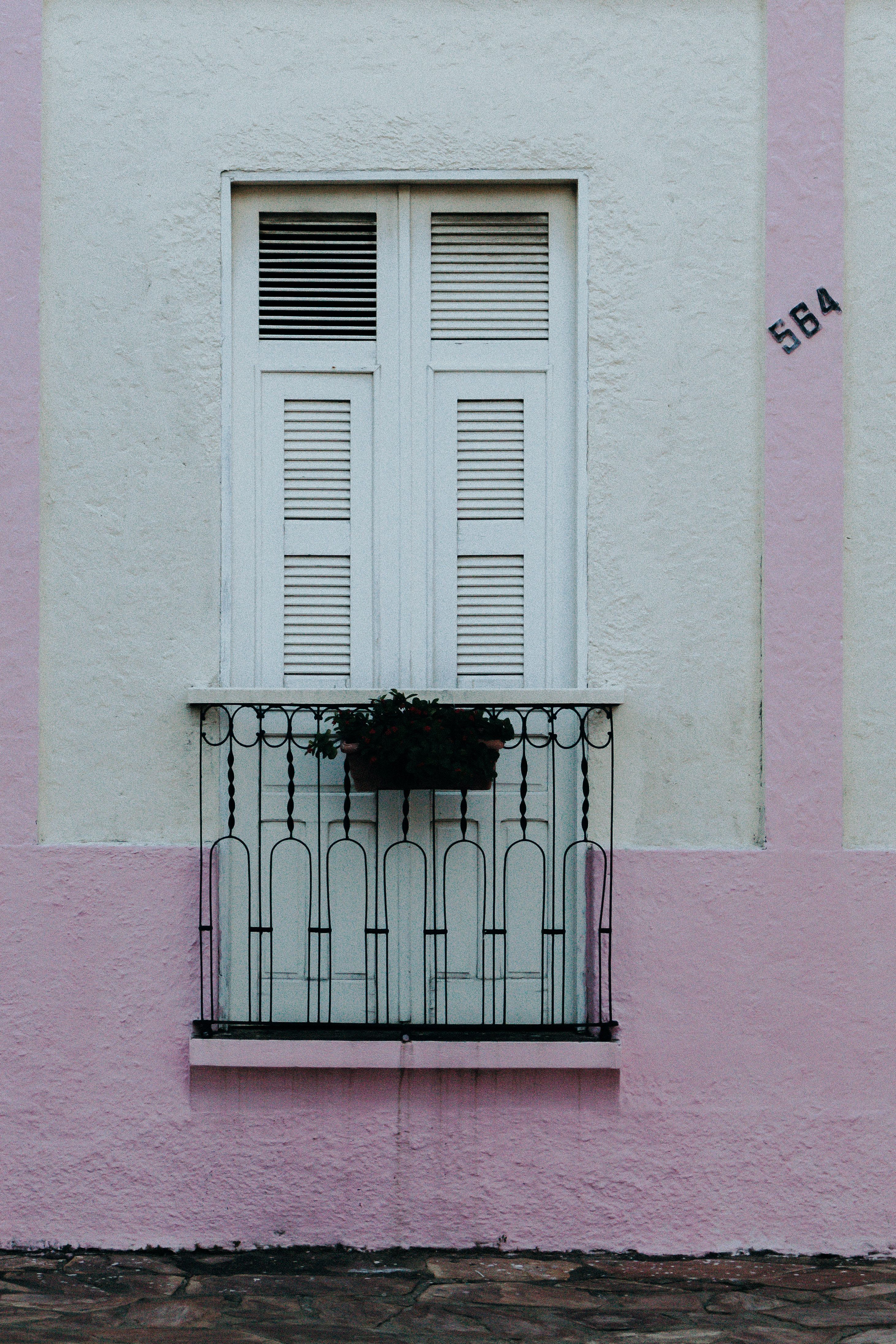 Balcony in a Pink Building · Free Stock Photo