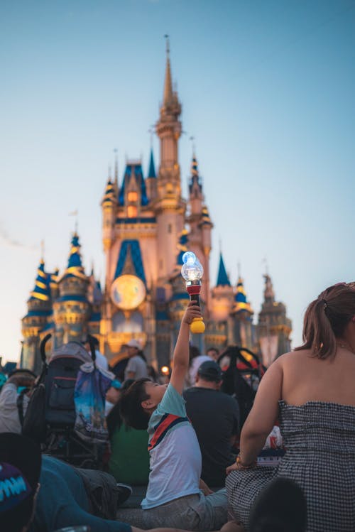 Free People Enjoying the Magic Kingdom Moment in Disney World Stock Photo