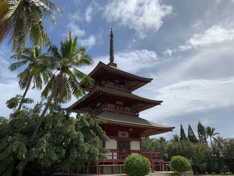 Lahaina Jodo Mission pagoda with palm trees in Maui