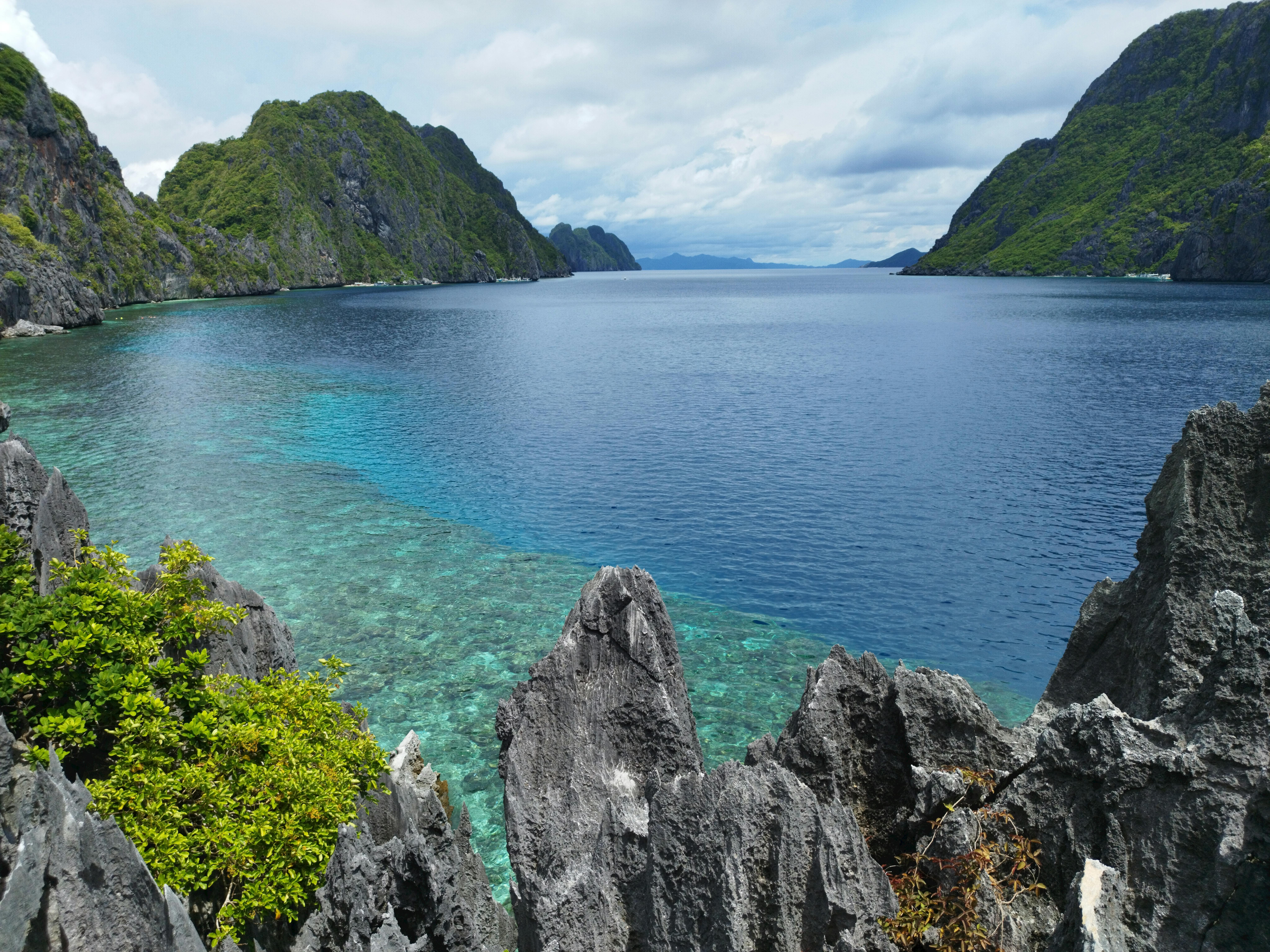 Limestone cliffs and clear water in El Nido, Palawan - best tropical vacations​