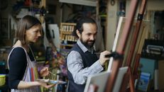 People Drawing on Canvas in Painting School