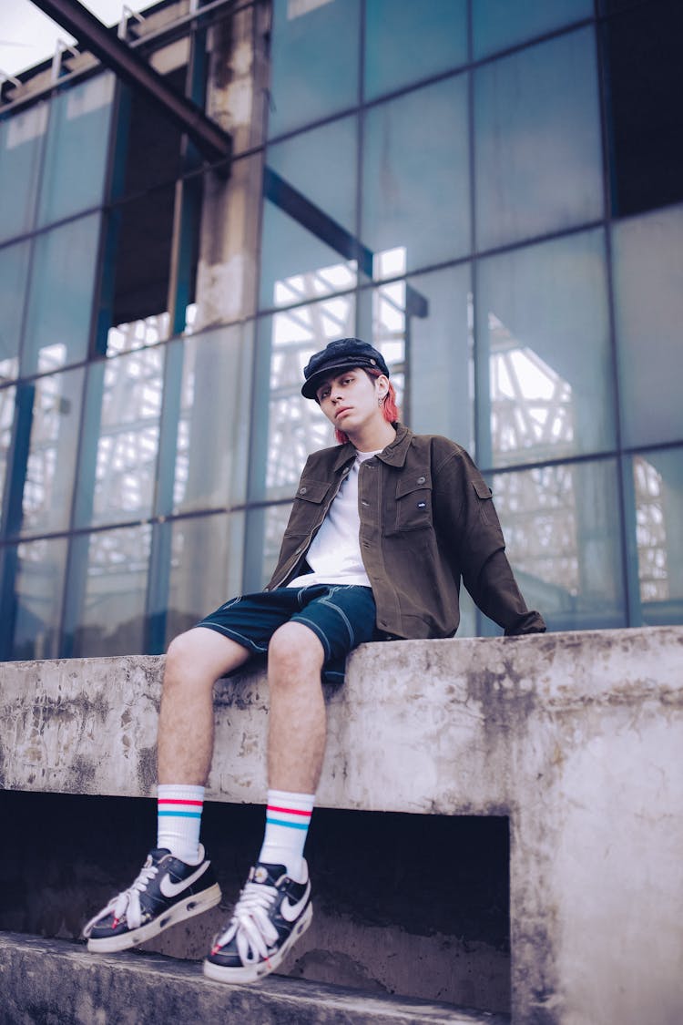 Teenager Posing For Fashion Photo Outside Industrial Building