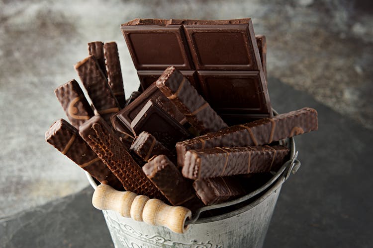 Chocolate Wafers And Bars On A Bucket