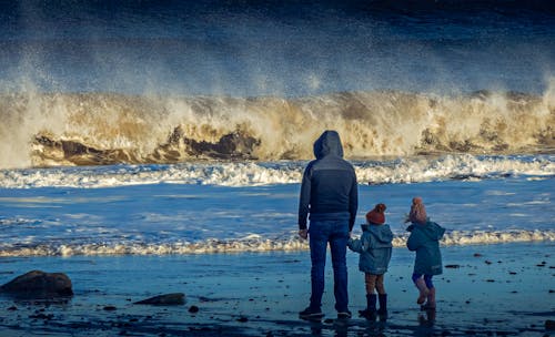 People Standing on Seashore