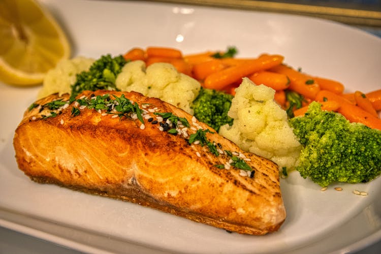 Cooked Fish Fillet Beside Mixed Vegetable