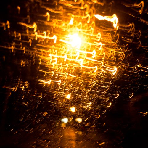 Golden light trails in long exposure, by Serge Cyneat on Pexels