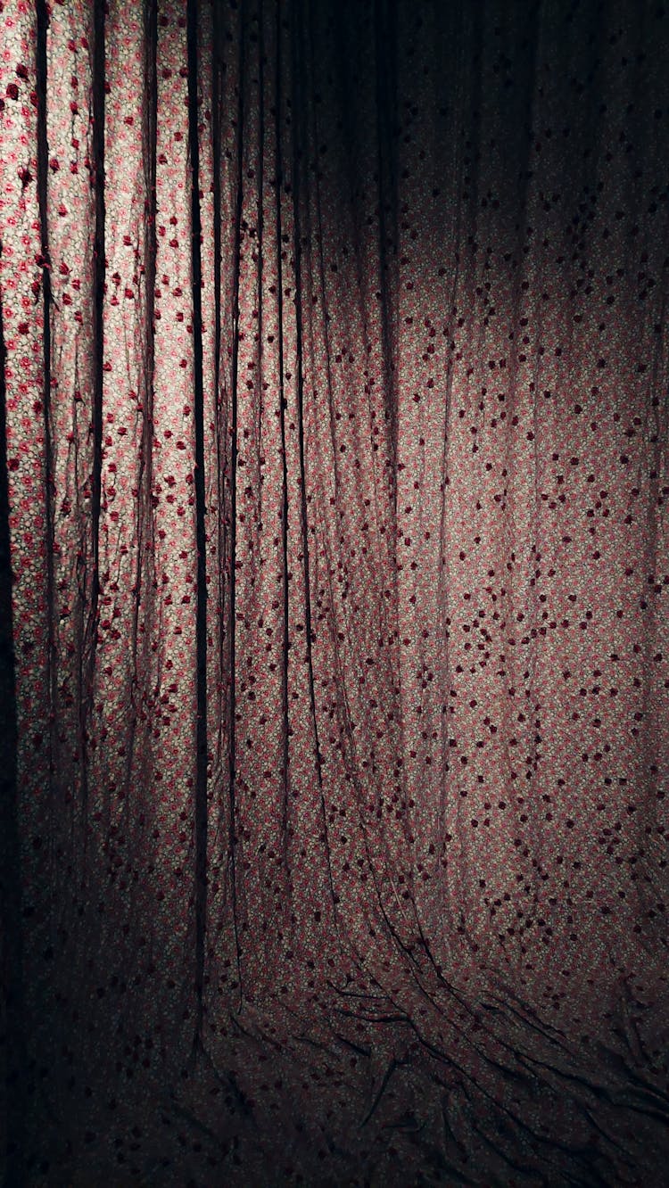 Red Curtain On The Wall