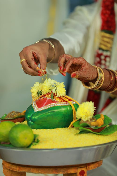 A Person Holding Yellow Flower Petals