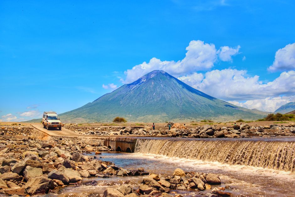 The road from JRO to Arusha with Mount Meru in the background The road from JRO to Arusha with Mount Meru in the background