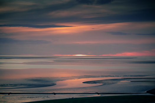 Body of Water Under Cloudy Sky during Sunset