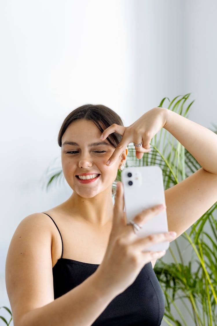 A Woman Having A Selfie