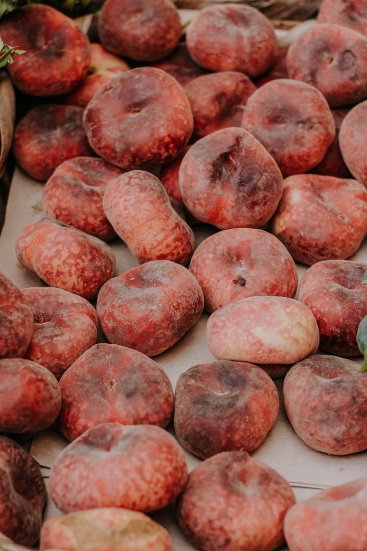 Ripe Peaches On Market Stall