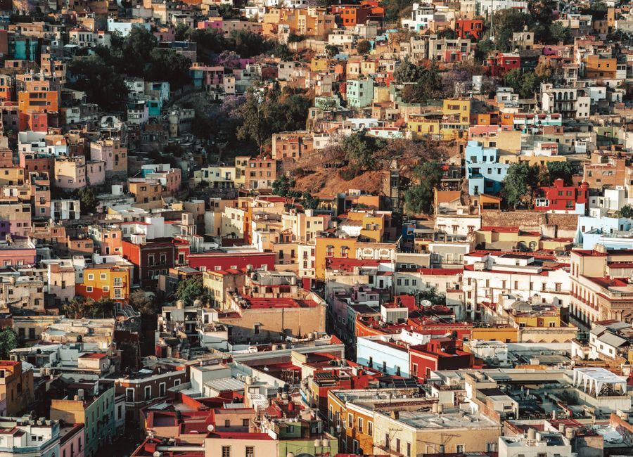 Colorful houses and architecture of Guanajuato City, Mexico, create a vivid cityscape.