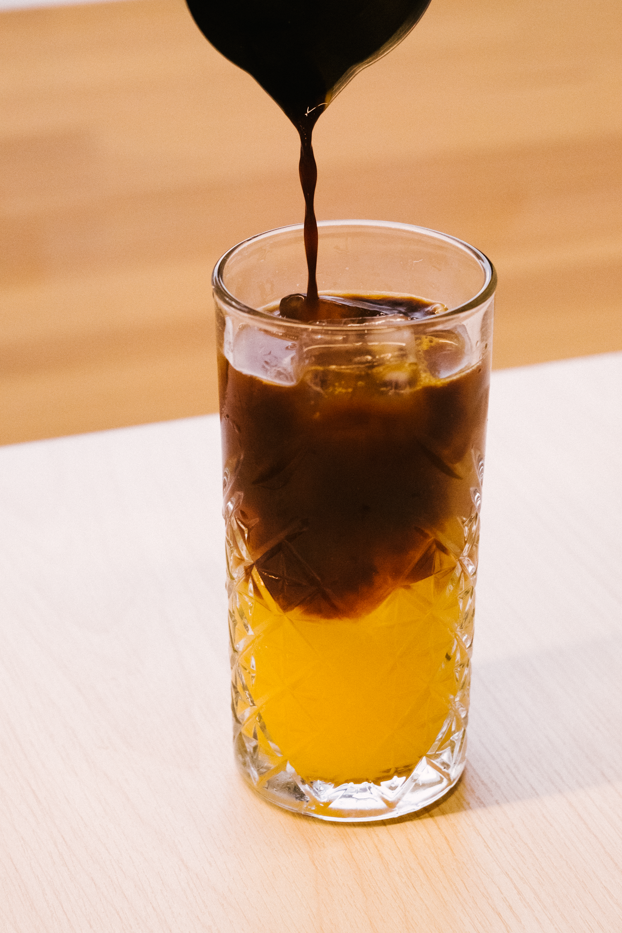 A Cola on a Drinking Glass with Ice Cubes · Free Stock Photo