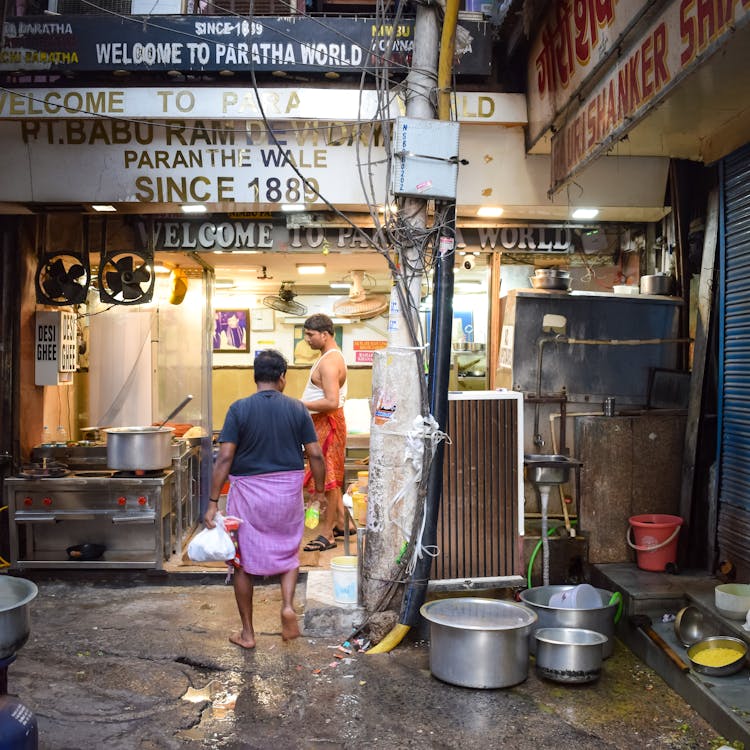 Men On Street Restaurant Kitchen In Yard