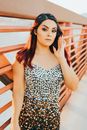 Woman in Black and White Floral Spaghetti Strap Dress