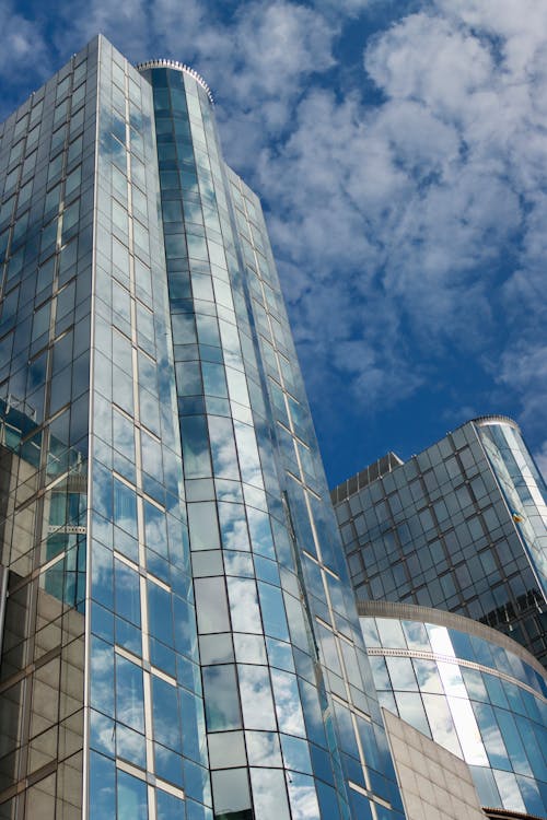 Low Angle Shot of a Building with Curtain Wall Under the Blue Sky