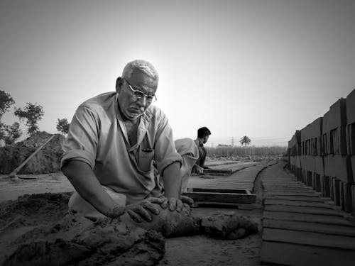 Men Manufacturing Bricks