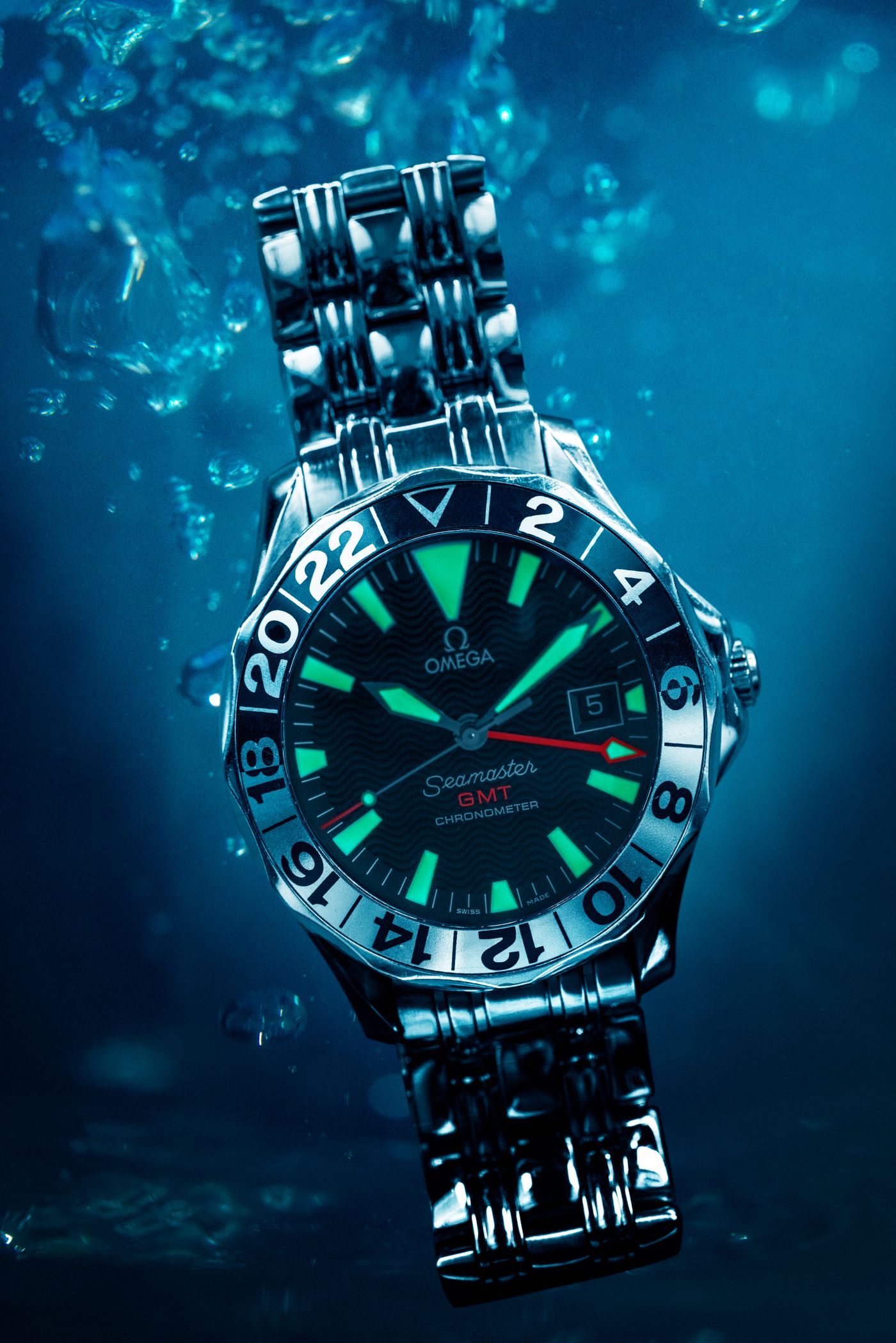 Diver-style wristwatch submerged in water