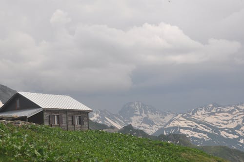 Wooden Cabin in Mountains 