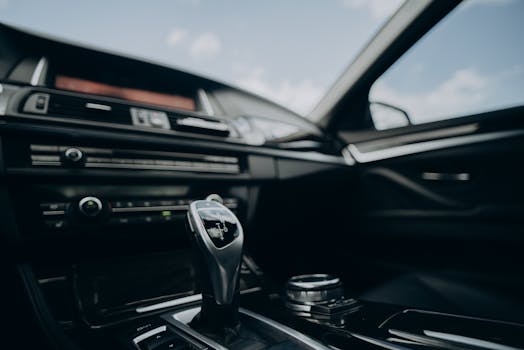 Explore the luxury of a BMW 5 Series with this detailed interior close-up showcasing modern design and features.