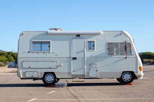 White Camper Van Parked on the Road