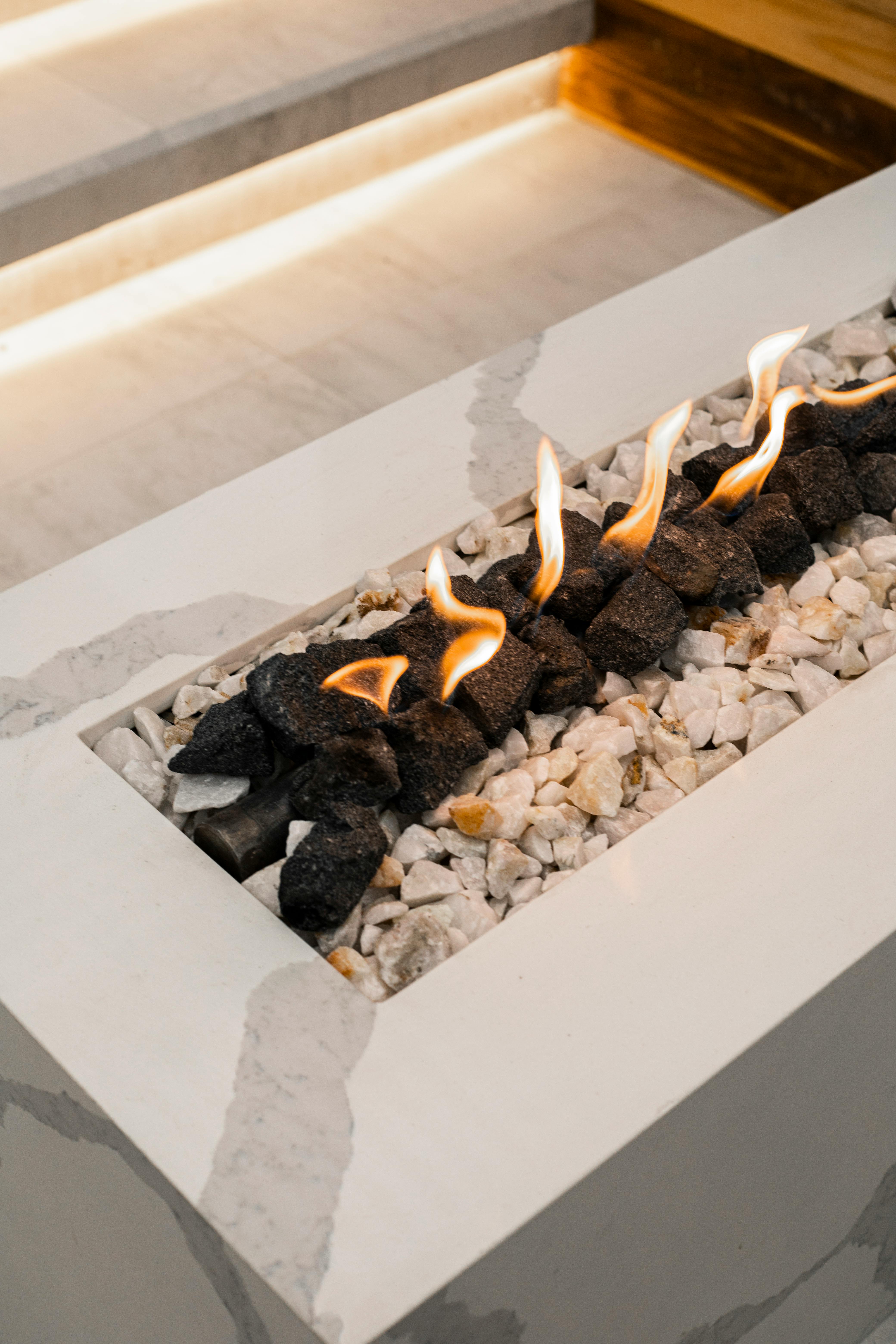 Modern gas fireplace with decorative stones