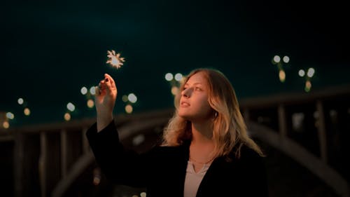 Woman Holding a Sparkler