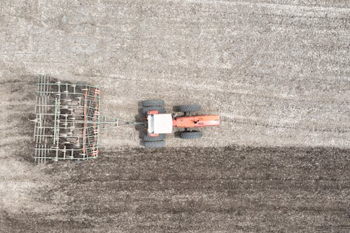 Бесплатное стоковое фото с Аэрофотосъемка, вид сверху, вспашка