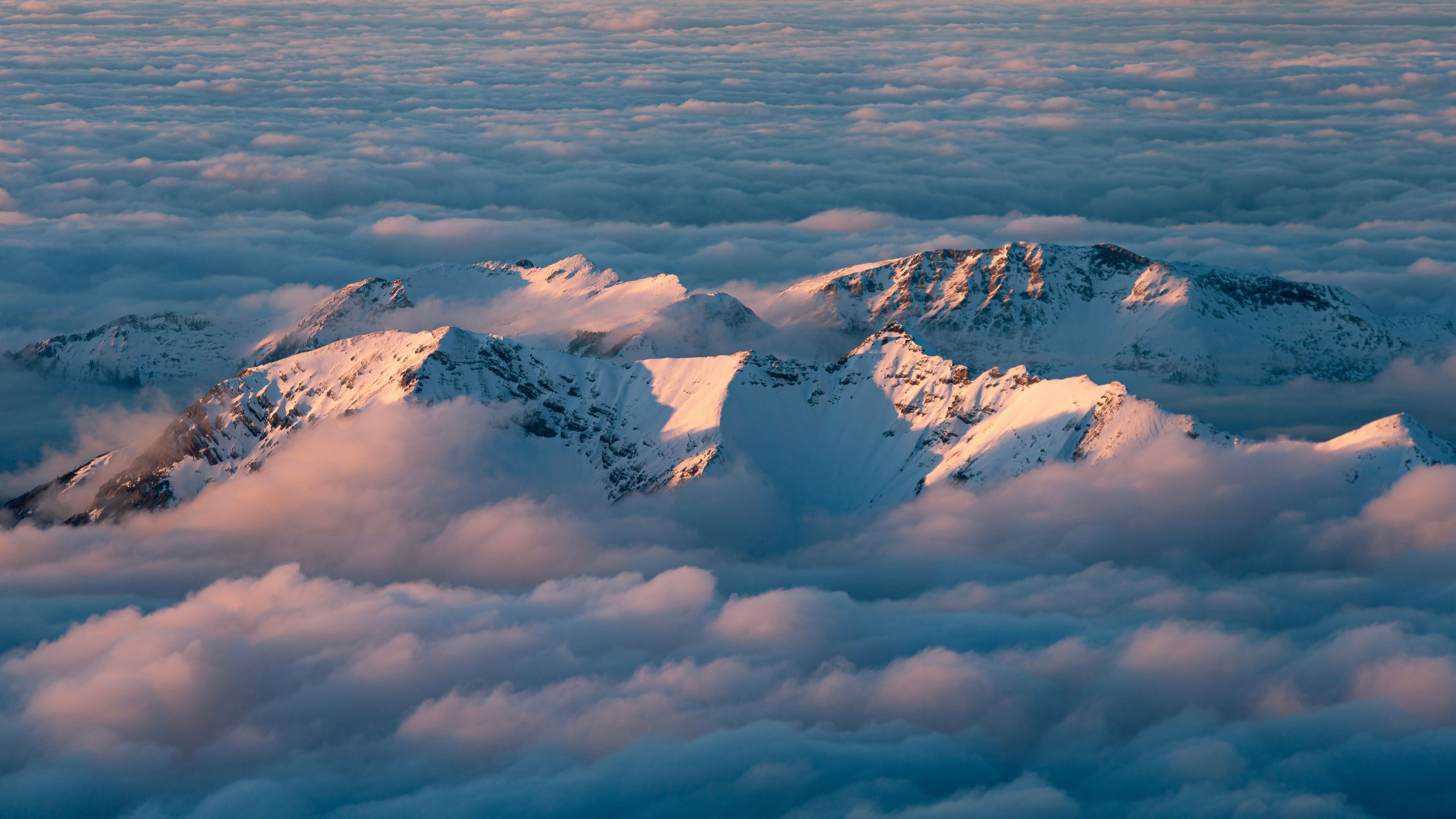 Aerial View of Snow Covered Mountains · Free Stock Photo