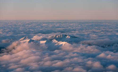 Free Mountain Peaks Over the White Clouds Stock Photo