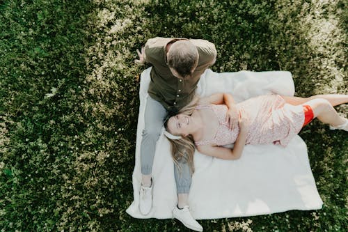 Couple on Blanket on Grass