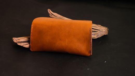 Hand-cut leather pouch, photo by Bilakis on Pexels